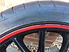 R113 18&quot; JCW gloss black wheels with red stripe-img_1672.jpg