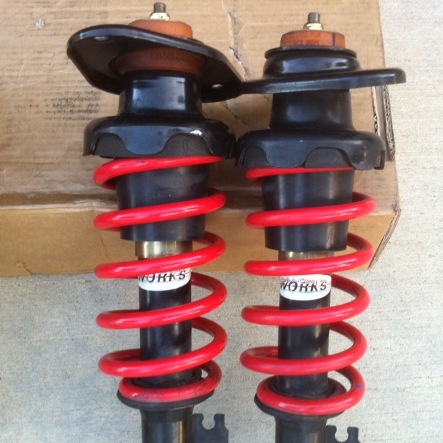 JCW Sport suspension with coil springs in Red